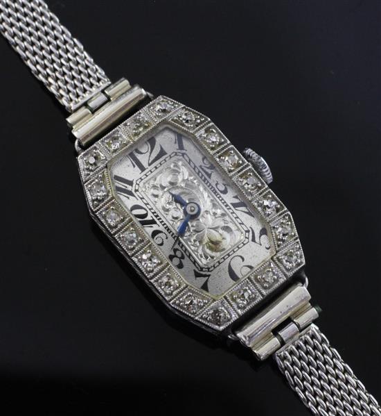 A ladys 1920s platinum and diamond manual wind cocktail watch,